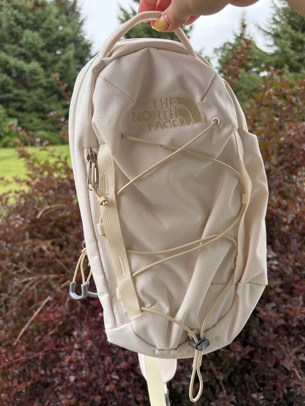 North Face borealis sling bag cream ivory mini backpack bag